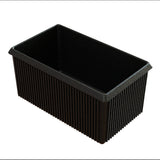 A rectangular black loaf pan crafted from cast aluminum with straight sides and a nonstick interior. The exterior features vertical ridges. The empty pan is photographed on a white background, angled to display both its interior and exterior surfaces.