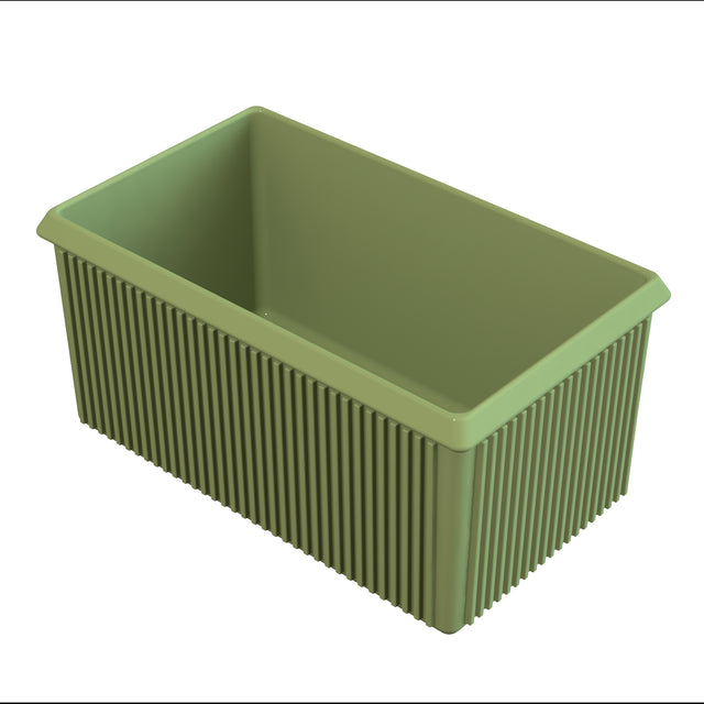 A rectangular, light green server bowl with vertical ridges on the outer sides and smooth inner surfaces. The plastic container is open at the top and viewed from a high angle.