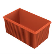 A rectangular, open-topped, orange plastic server bowl with ribbed vertical lines on its exterior sides. The bowl has slightly flared edges at the top, a smooth inner surface, and is empty against a white background.