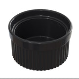 A black, round, ribbed plastic Souffle Bowl with a shiny finish is shown. The cup is empty and viewed from a slightly elevated angle, with the inside and outer textured sides clearly visible against a white background.