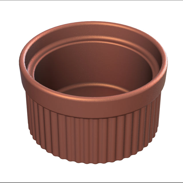 A brown, round souffle bowl with a ribbed exterior and smooth interior, viewed from a slightly elevated angle. The dish has thick walls and a glossy finish, designed for baking or serving individual portions.
