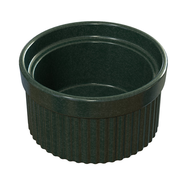 A dark green, round ceramic Souffle Bowl with vertical ridges on the lower half and a smooth rim. The glossy interior contrasts with the matte finish exterior for a sturdy, elegant look. This dishwasher safe ramekin is empty and seen from a slight angle.