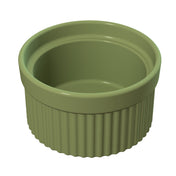 A small, round, green souffle bowl with smooth sides on top and vertical ridges around the bottom half. The ramekin sits on a white background and appears empty. This dish is also dishwasher safe for easy cleaning.