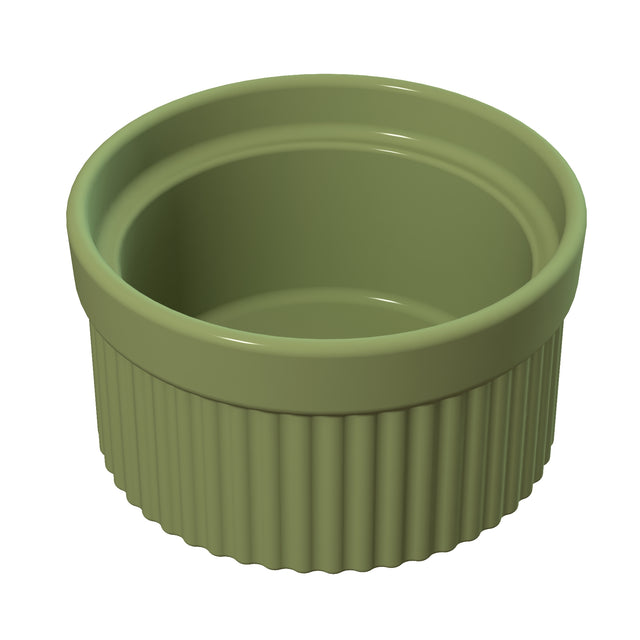 A small, round, green souffle bowl with smooth sides on top and vertical ridges around the bottom half. The ramekin sits on a white background and appears empty. This dish is also dishwasher safe for easy cleaning.