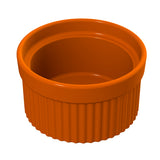 A glossy, orange Souffle Bowl with a smooth interior and ridged exterior sits on a white background. This small, round dish has straight sides, an overall shiny finish, and is dishwasher safe for easy cleaning.