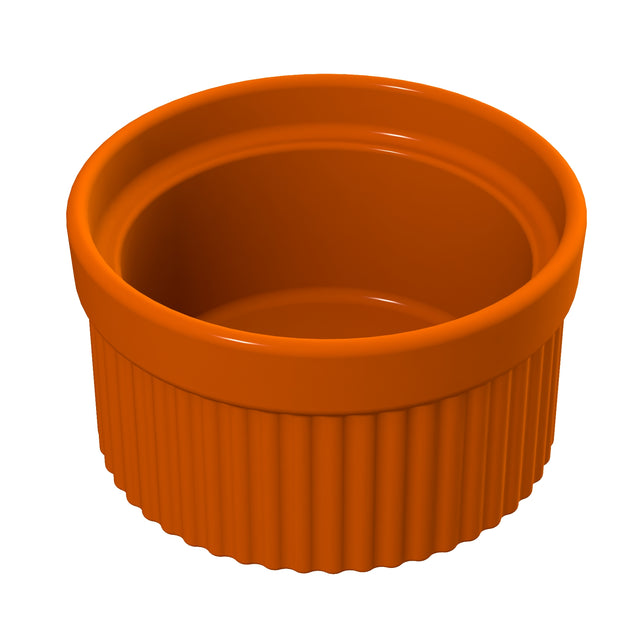 A glossy, orange Souffle Bowl with a smooth interior and ridged exterior sits on a white background. This small, round dish has straight sides, an overall shiny finish, and is dishwasher safe for easy cleaning.