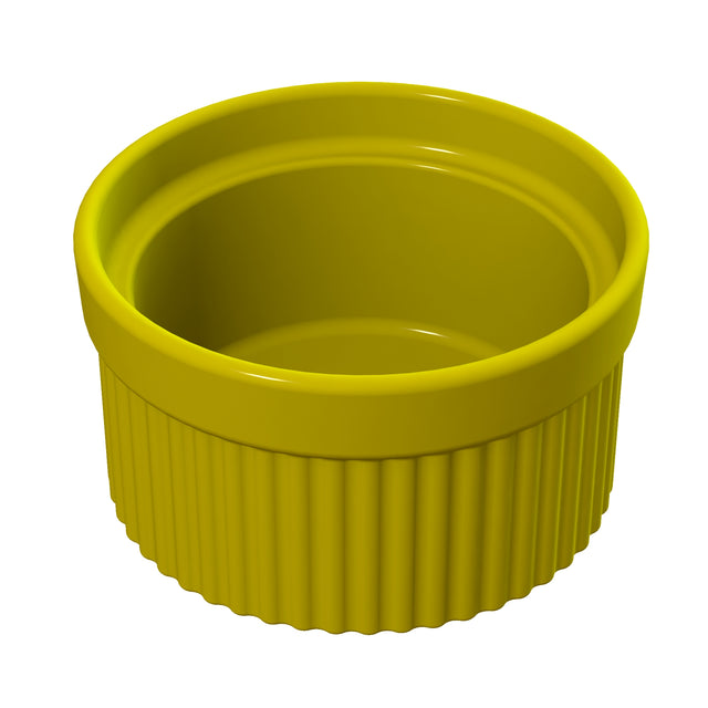 A yellow, round Souffle Bowl with a smooth interior and ribbed exterior. This ceramic ramekin has straight sides, is dishwasher safe, and is perfect for baking or serving small portions. The lighting highlights its glossy surface.
