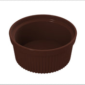 A brown, ribbed, round plastic souffle bowl is shown on a white background. The cup is empty and has smooth, glossy sides with vertical ridges around the exterior. This bowl is dishwasher safe for easy cleaning.