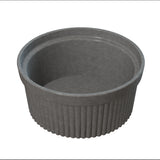 A gray, round Souffle Bowl with a ribbed exterior and smooth inner surface is shown. This ceramic ramekin, ideal for baking or cold holding individual desserts, features straight sides and a wide opening against a plain white background.