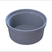A white, round ceramic souffle bowl with vertical ridges on the exterior sits on a white background. The ramekin is empty, has a smooth inner surface, and is dishwasher safe—perfect for baking or serving individual portions.