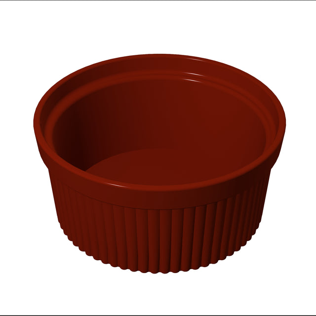 A small, round, deep-red Souffle Bowl with a ribbed exterior and smooth interior sits on a white background. This ceramic dish is empty, featuring vertically fluted sides and a slightly thicker, smooth rim.