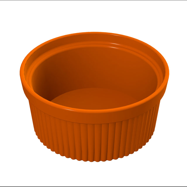 A small, round, orange ceramic souffle bowl with vertical ridges on the exterior and a smooth, glossy finish inside. Dishwasher safe, the dish is empty and set against a plain white background.