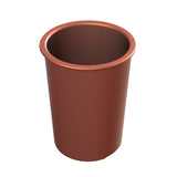 A brown, cylindrical salad dressing crock with a slightly flared rim, viewed from an elevated angle against a white background. The crock appears to be made of plastic or ceramic and is empty.