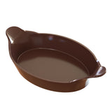 A brown, oval-shaped Au Gratin baking dish with a smooth interior and two short handles, each featuring a ridged design. Made of cast aluminum, the empty dish is set against a plain white background.