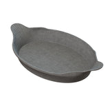 A gray, oval-shaped Au Gratin baking dish with slightly flared sides and two small handles on opposite ends. The surface has a smooth, matte finish, and the dish appears to be made of ceramic or cast aluminum. The subtly ridged handles offer grip.