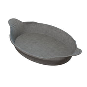 A gray, oval-shaped Au Gratin baking dish with slightly flared sides and two small handles on opposite ends. The surface has a smooth, matte finish, and the dish appears to be made of ceramic or cast aluminum. The subtly ridged handles offer grip.