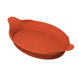 A bright orange, oval-shaped silicone Au Gratin baking dish with two small, textured handles on opposite sides. The dish has smooth sides and a flat base, ideal for baking or roasting, and is placed on a white background.