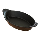 An empty, oval-shaped Duracoat coated cast aluminum baking dish with a speckled interior, slightly sloped sides, and two small handles on each end. The brown exterior dish is shown on a white background. Ideal for cold holding or use by your server.