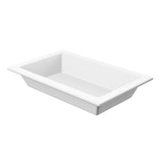 A rectangular, white, shallow tray from the Aurora Collection Food Pan line features slightly sloped sides and a wide rim. Made from Duracoat coated cast aluminum, it offers a smooth, glossy surface and is ideal as a cold holding food pan.