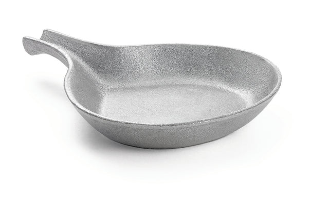 A small, round, shallow aluminum skillet with a textured surface and a short, curved handle, photographed on a white background. This temperature resistant pan is ideal for versatile cooking tasks.