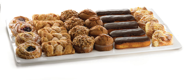 An extra large serving platter is filled with assorted pastries, including fruit danishes, crumb-topped muffins, chocolate eclairs, and cheese danishes, all arranged neatly in rows against a white background.