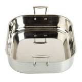 A shiny, rectangular tri-ply stainless steel roasting pan with rounded corners and two metal handles on each short side. The interior is reflective and smooth, and the empty pan is shown from a slightly elevated front angle.