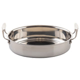 A round, shallow stainless steel pan server with two upright, oval-shaped handles sits empty on a plain white background. Its shiny, reflective surface highlights its sturdy oven safe design and modern appeal.