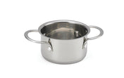 A shiny, oven safe stainless steel pot with two large handles sits on a plain white background. Its smooth, reflective surface and metallic interior make it perfect as a stylish mini server. The pot has no lid.