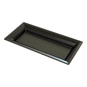 A rectangular, black cast aluminum platter with raised edges and a glossy finish. The surface is decorated with tiny white speckles evenly distributed across the tray, giving it a subtle, starry appearance. Photographed empty on a white background.