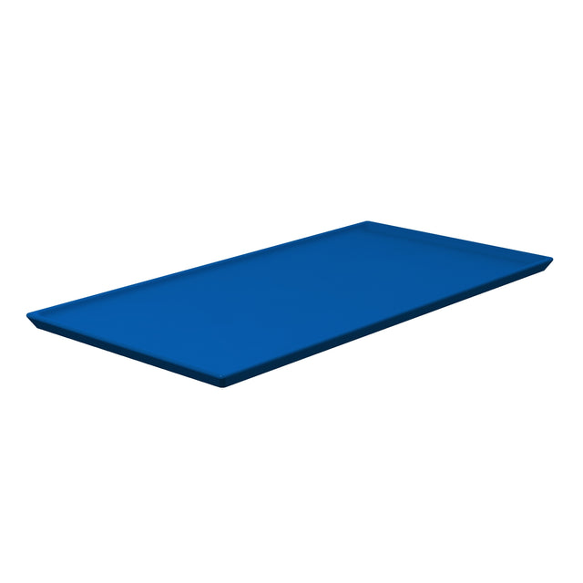 A rectangular, flat, cobalt blue tray with slightly raised edges. Crafted from cast aluminum, it’s shown on a white background and viewed from an angle, highlighting its smooth surface and simple design.