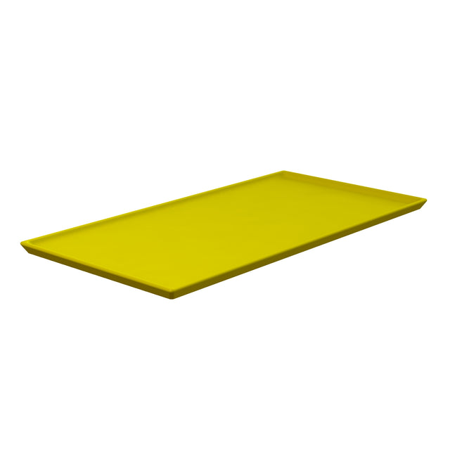 A rectangular, flat yellow cast aluminum tray with slightly raised edges is shown on a white background at a slight angle, revealing both surface and thickness. The tray has a smooth, glossy finish and doubles as a cooling plate platter for cold holding.