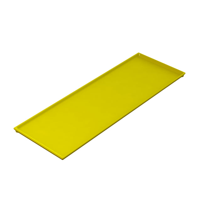 A rectangular, flat, yellow cooling plate serving tray with slightly raised edges on all sides, shown on a white background at an angle that reveals its shallow depth and smooth surface.