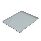 A rectangular, shallow, white cooling plate serving tray with slightly raised edges, viewed at an angle from above. The surface is smooth and glossy, and the tray appears empty and clean.