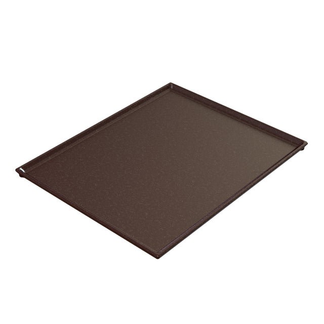 A rectangular, flat, dark brown Duracoat coated cast aluminum baking tray with slightly raised edges on three sides and a flat edge for easy sliding. Dishwasher safe, it rests on a white surface and is photographed at an angle.