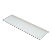A rectangular, flat, white cold holding tray with slightly raised edges is shown on a plain white background. This Duracoat coated cast aluminum tray has a smooth surface and is viewed from an angled, top-down perspective.