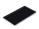A rectangular, flat black cast aluminum tray with raised edges and a smooth surface, designed as a cooling plate serving tray, photographed on a white background and angled slightly to show its depth and clean lines.