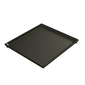 A square, black cast aluminum baking tray with slightly raised edges and a smooth surface with small white speckles, shown on a white background. The tray is empty and angled slightly to the right.
