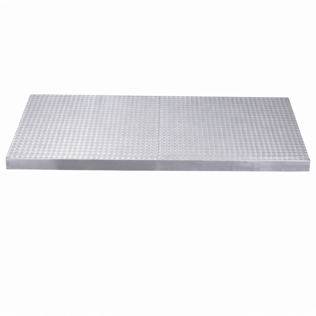 A rectangular stainless steel platform with a flat, diamond-patterned surface and a smooth edge, viewed from a slight angle against a plain white background.
