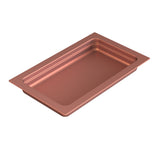 A rectangular, shallow, copper-colored cast aluminum food pan with slightly raised edges and smooth, rounded corners, viewed from an angled perspective against a white background.