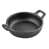 A round, black cast iron Mini Server pan with two short handles on opposite sides. The TableCraft pan features a rough, textured surface and is empty, shown against a plain white background.