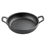 A round, black cast iron pan with two handles on opposite sides. This TableCraft mini server features a textured surface and slightly sloped sides, sitting on a white background. The short, rectangular handles allow for easy gripping.