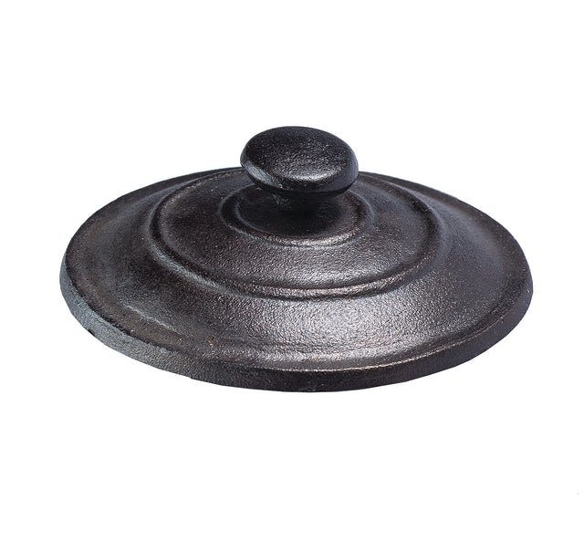 A round, black cast iron TableCraft mini casserole lid with a central, dome-shaped handle. Its matte, textured surface and concentric ridges give it a classic look. Designed to fit snugly on your pot or pan for reliable cooking.