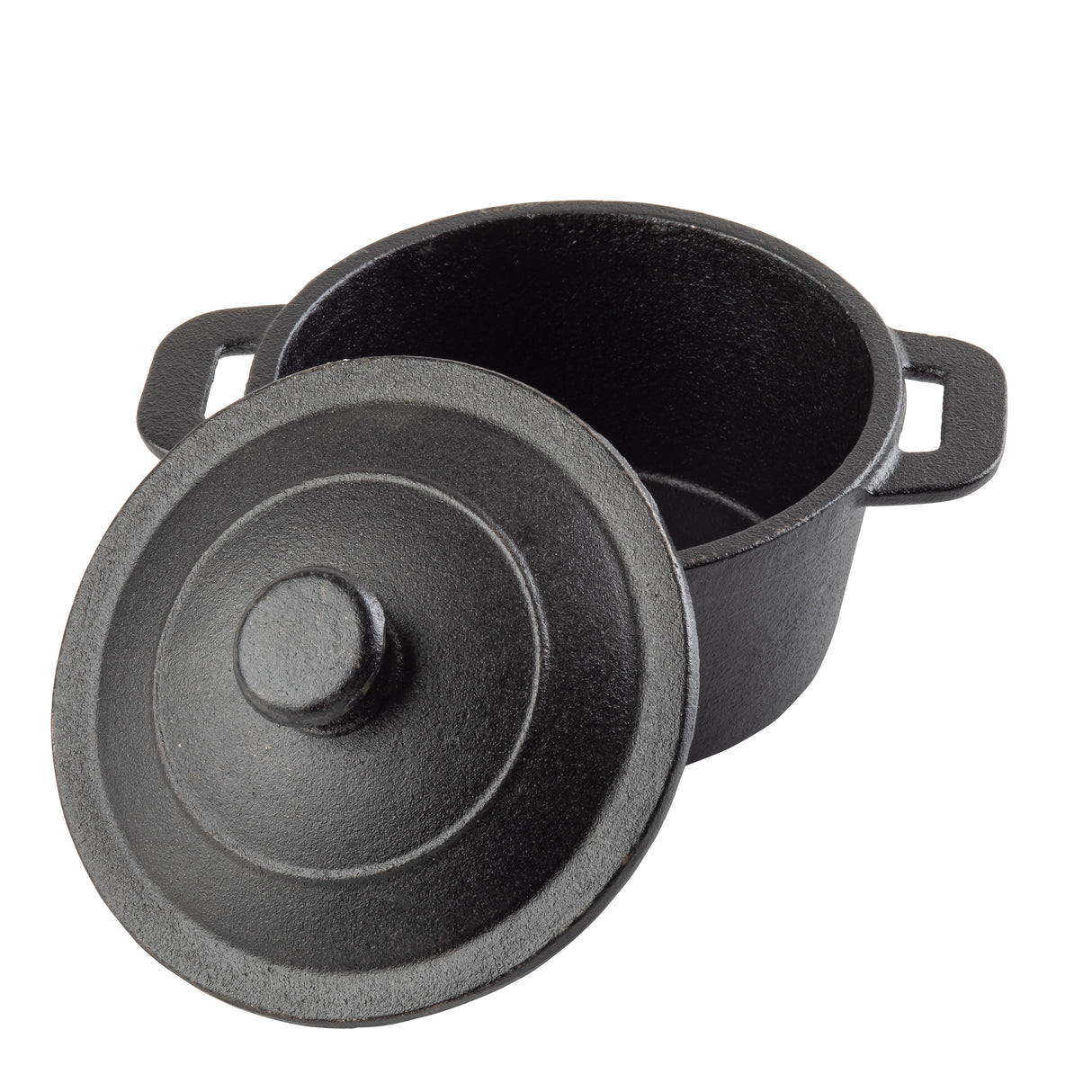 A black cast iron Dutch oven with a matching lid partially tilted off, revealing the empty interior. The pot has two side handles and a textured surface, resembling a TableCraft mini casserole dish, positioned on a white background.