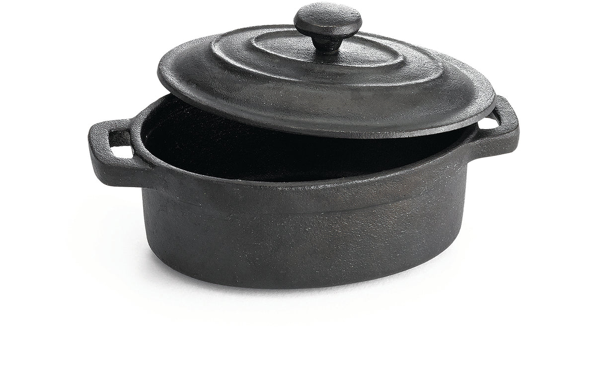 A black cast iron TableCraft dutch oven with two side handles and a matching lid, shown partially open. The textured surface appears matte, and the pot rests on a white background, casting a faint shadow.