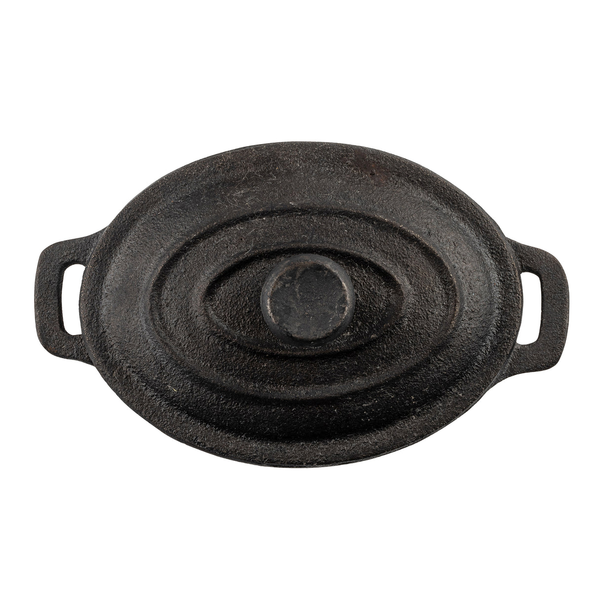 Overhead view of a black cast iron Dutch oven with a lid featuring concentric oval ridges and a central knob handle. The slightly worn surface hints at frequent use, while sturdy side handles evoke the charm of a classic TableCraft mini casserole dish.