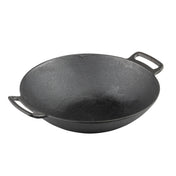 A black cast iron wok with a wide, round base and high, sloping sides. Induction ready, it features two short, sturdy handles for easy lifting. The wok sits on a plain white background.