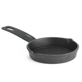A TableCraft mini skillet made of black cast iron with a long handled hole. Featuring two spouts for easy pouring and a textured surface, this compact skillet is displayed on a white background.