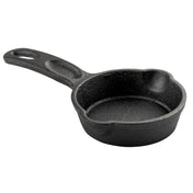 A small, round TableCraft Mini Skillet made of black cast iron with a textured surface, short sides, and a sturdy handle featuring a hole for hanging. Two small spouts on opposite sides allow easy pouring. The background is plain white.