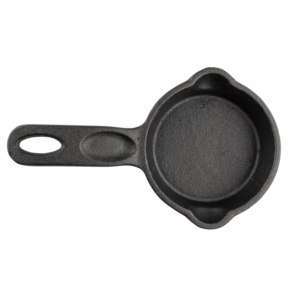 The TableCraft Mini Skillet is a small, round, black cast iron skillet with a handle featuring an oval hole. It has two small pouring spouts on opposite sides and a textured surface, shown against a white background.