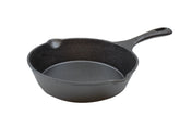 A black cast iron skillet with a textured surface sits on a white background. This induction ready skillet features a single handle with a hole for hanging and small pour spouts on each side of the rim.